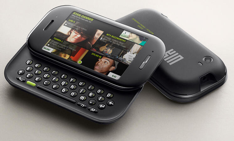 Two Microsoft Kin TWOs, one of them with its keyboard out.